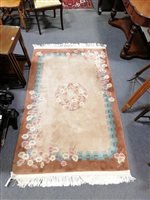 Lot 467 - Chinese sculptured rug, fawn ground, bordered outlines