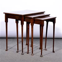 Lot 398 - Nest of three walnut occasional tables