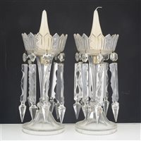 Lot 3 - Two cut-glass candle lustres, each with eight prismatic drops.