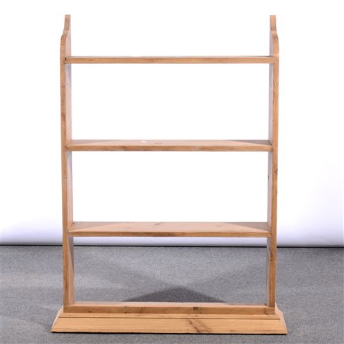 Lot 513 Pine wall shelf unit, three heights under a