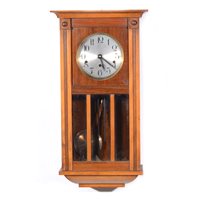 Lot 442A - Stained beechwood wall clock.