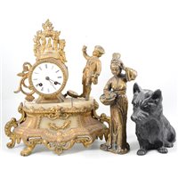Lot 128 - A figural gilt spelter mantel clock, (af), cast metal Scotty dog and a figure of a Japanese Geisha, (3).