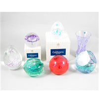 Lot 11 - A collection of six Caithness glass paperweights and a vase.