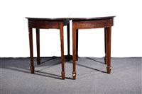 Lot 472 - Georgian circular mahogany eight legged dining table