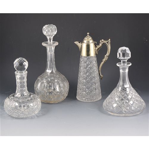 Lot 41 - Moulded glass claret jug, electroplate mounts, and various decanters.