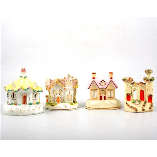 A collection of twenty five Staffordshire pottery cottages and pastille...