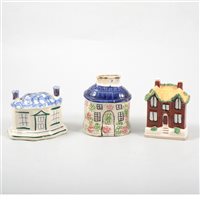 Lot 5 - Three Pratt type pottery cottage money boxes.