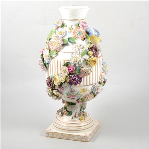 Lot 38 - German porcelain urn shape vase, encrusted floral decoration and modelled with birds, (restored)