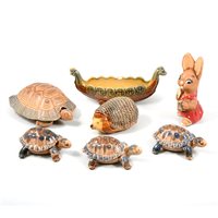 Lot 44 - A collection of Wade Pottery pin boxes, Whimsies, and Pendelfin figures.