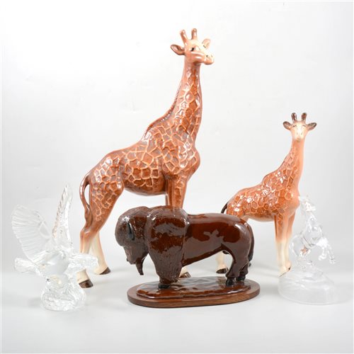 Lot 48 - Two Melba ware pottery models of Giraffes, a pottery buffalo, a Waterford Crystal eagle, and a similar model of a rearing horse.