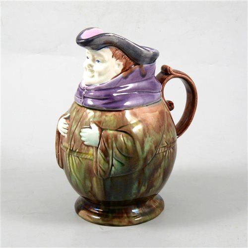 Lot 7 - French Majolica style jug, modelled as a rotund toby, 22cm.