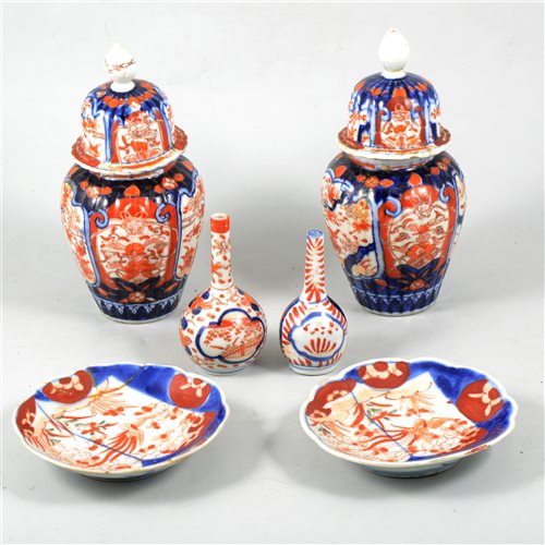 Lot 80 - Pair of Imari covered vases, two small Imari bottle vases, three bowls, plates and dishes.