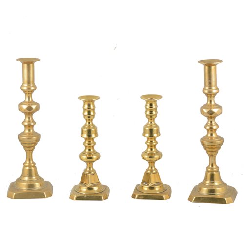 Lot 127 - Pair of Victorian turned brass candlesticks, 23cm, and other candlesticks, etc.