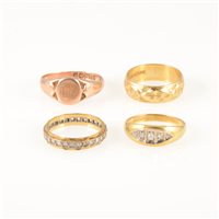 Lot 249 - Four gold rings, an 18 carat yellow gold 5.8mm wide diamond cut wedding band, approximate weight 4.8gms, ring size K