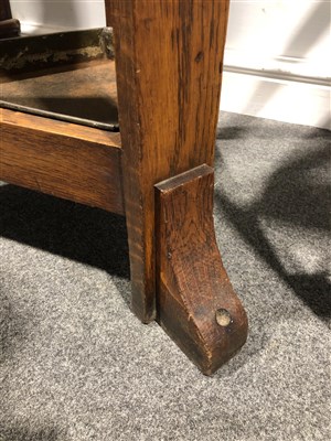 Lot 513 - An Arts and Crafts oak hall stand, circa 1910