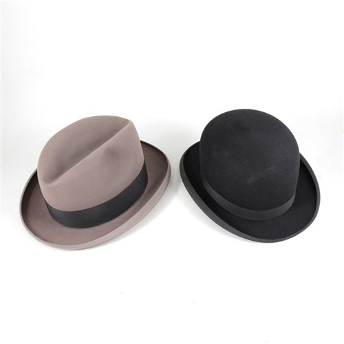 Lot 134 - A vintage black bowler hat and a taupe trilby.