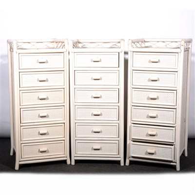 Lot 363 - Three white painted bamboo and rattan six-drawer pedestal, ...
