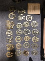 Lot 94 - Two boxes of brass ware, including horse brasses, jam pan, fire pokers, candle sticks etc.