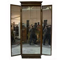 Lot 460 - A full-length cabinet mirror