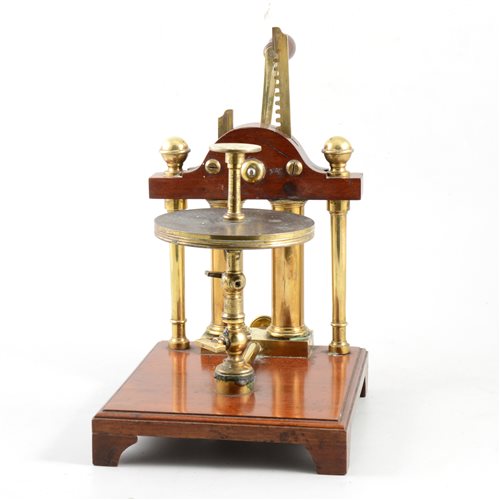 Lot 194 - A 19th century two cylinder vacuum pump, mahogany, lacquered brass and glass.