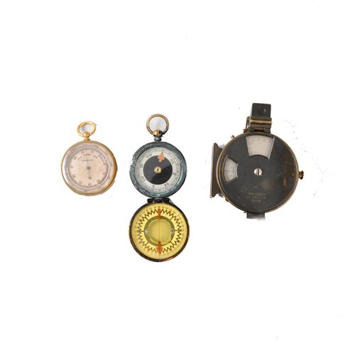 Lot 192 - Brass pocket barometer, a Woods military gun sight, and a pocket compass.