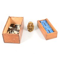 Lot 123 - Boxed bone and ebony dominoes, plastic dominoes, chess board, brass monkey, silver cigarette box.