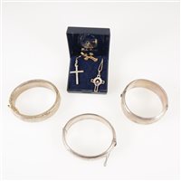 Lot 288 - Two silver hollow half hinged bangles 16mm, 23mm, a metal bangle, two pairs of gilt metal cufflinks, a 9 carat yellow gold cross set with a garnet on a fine chain, two other cross pendant.