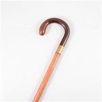 Lot 111 - AMENDMENT: Vintage walking stick, amber coloured plain loop handle, 18ct gold-plated ferrule