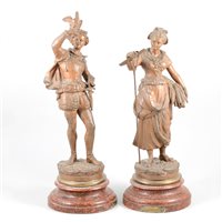 Lot 172 - After Rancoulet, a pair of patinated spelter figures, 'Fauconnier' and 'Faneuse'