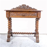 Lot 436 - Carved oak side table