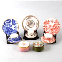 Lot 28 - A collection of modern enamel pill boxes and miniature  Wedgwood trios.