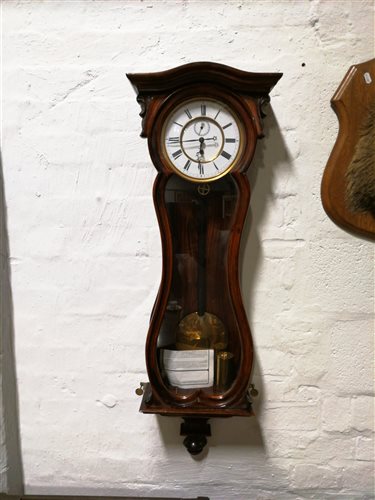 Lot 211 - Continental simulated rosewood cased wall clock