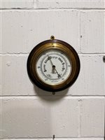 Lot 179 - A brass drum cased ship's barometer