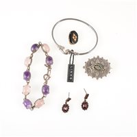 Lot 283 - A collection of costume jewellery, a circular sapphire cluster pendant 14mm diameter, simulated pearls, an amethyst and rose quartz bracelet, a black onyx and seed pearl brooch