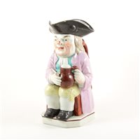 Lot 6 - Staffordshire pearlware type Toby jug in the manner of Enoch Wood, ...