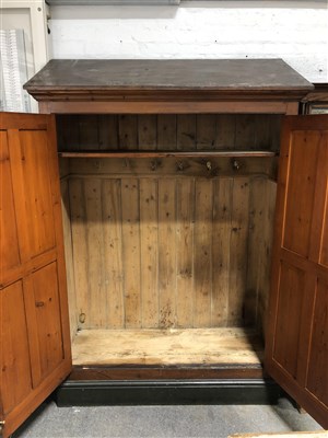 Lot 347 - A pitch pine Gothic Revival style wardrobe/ cloak cupboard