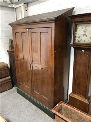 Lot 347 - A pitch pine Gothic Revival style wardrobe/ cloak cupboard