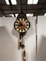 Lot 216 - A modern dial clock, ceramic centre printed with a bucolic scene
