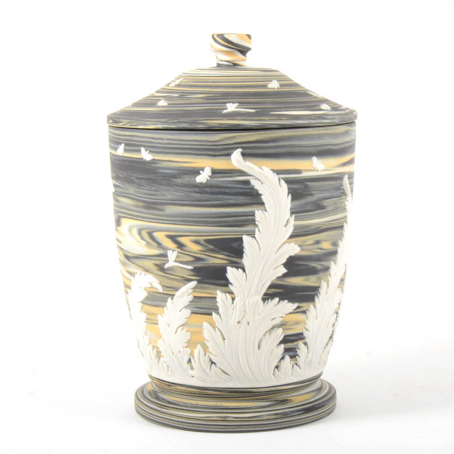 Lot 28 - A marbled Jasperware jar and cover, by Wedgwood.