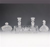 Lot 15 - Moulded clear glass 8-piece dressing table set.