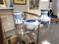Lot 30 - Three Wedgwood blue Jasperware jugs