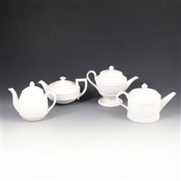 Lot 34 - Four Wedgwood white jasper teapot form candleholders.
