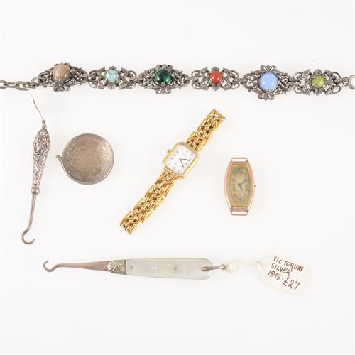 Lot 284 - A box of collectables and jewellery, two small mother of pearl button hooks and a silver handled one, a lady's Pulsar gold-plated bracelet watch, a vintage watch with 18k case