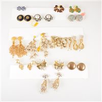 Lot 314 - Twenty-nine pairs of vintage clip on costume jewellery earrings, coloured and clear paste stones, gilt metal to include earrings by Togo Paris, Louis Feraud, Weiss, Jewelcraft etc.
