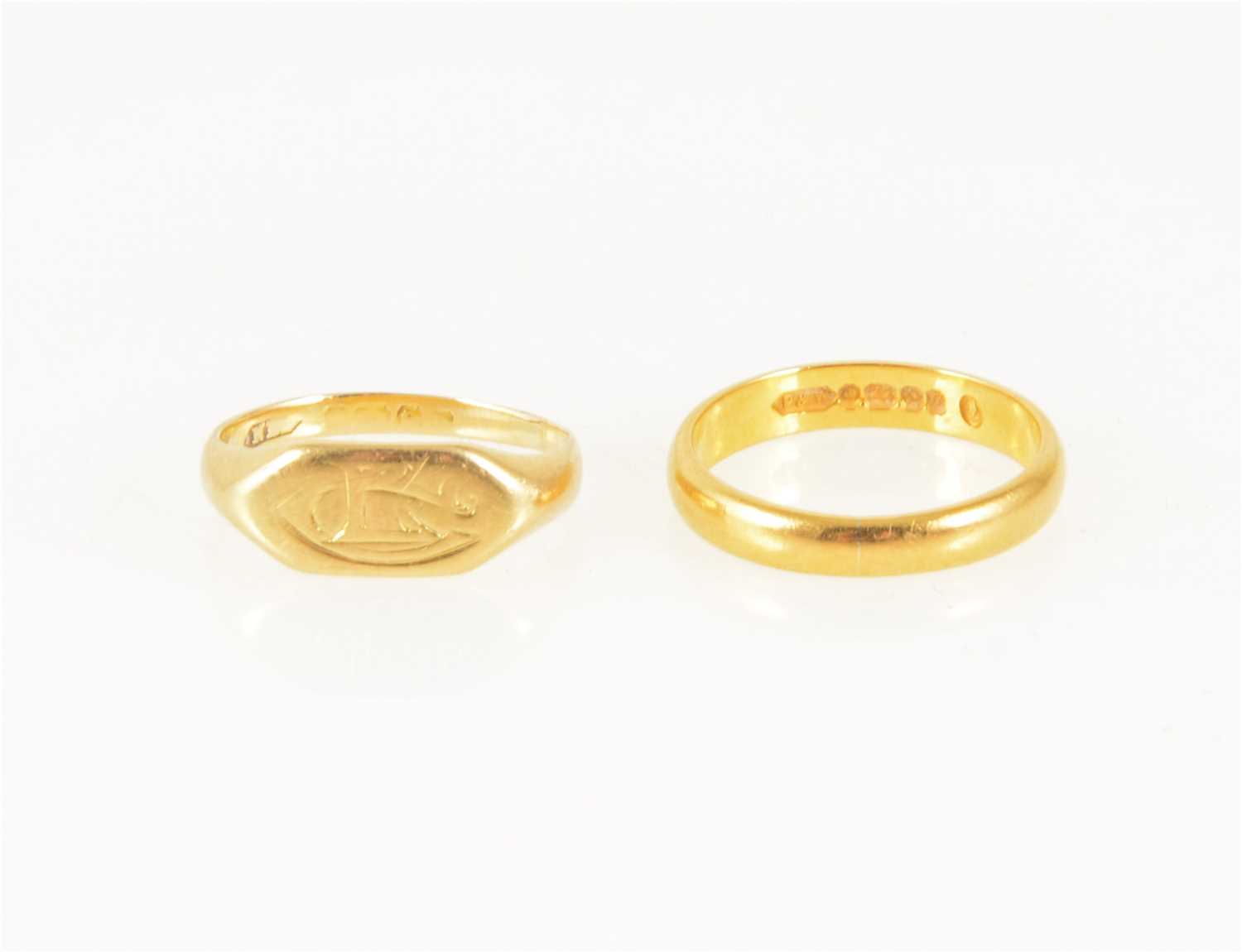 Lot 179 - A 22 carat gold wedding band, 3mm wide D shape, approximate weight 3.2gms, ring size K, a gold signet ring probably 18 carat, 3gms., size H.