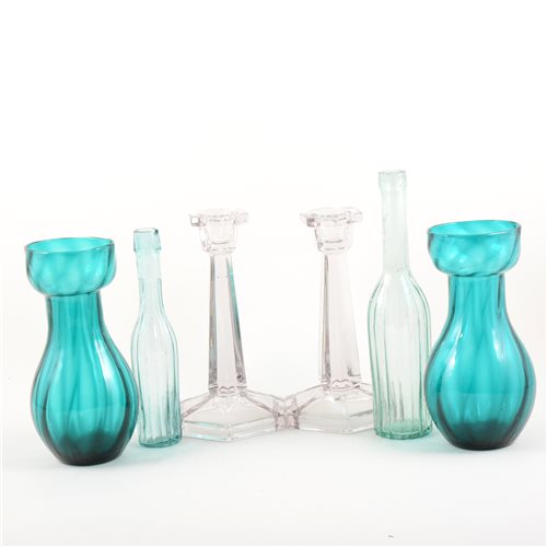 Lot 36 - A collection of decorative glass bottles, cod bottle, pair of Stuart crystal squat glass candlesticks, three pairs of coloured glass hyacinth vases