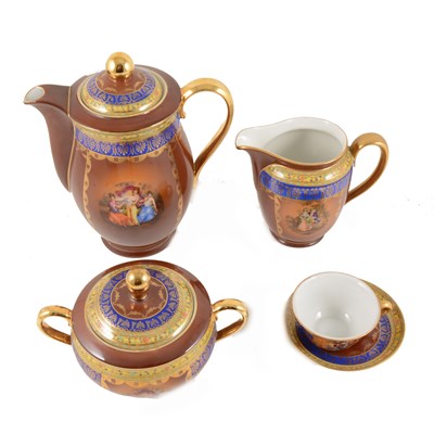 Lot 2 - A Slovakia coffee service in the "Rembrandt" design, burgundy ground with borders of blue and gilt, yellow floral.