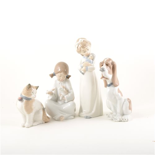 Lot 29 - Two Lladro models of cats, ...