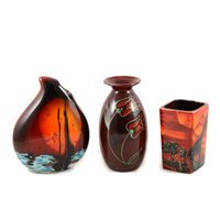 Lot 13 - Five contemporary vases by Anita Harris, various backstamps, a signed red 15cm rectangular vase with palm trees and giraffe