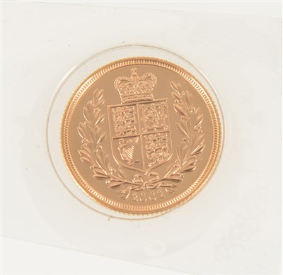 Lot 203 - A Full Sovereign - Queen Elizabeth II 2002, Shield back, Golden Jubilee issue, sealed in plastic, boxed with The Collector limited edition certificate.